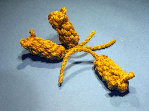 Knotted mice   cat toy Paracord Animals, Persian Cat Haircut, Crown Knot, Cat Haircut, Cat Enrichment, Cat Diy Crafts, Paracord Projects Diy, Paw Jewelry, Diy Pet Toys