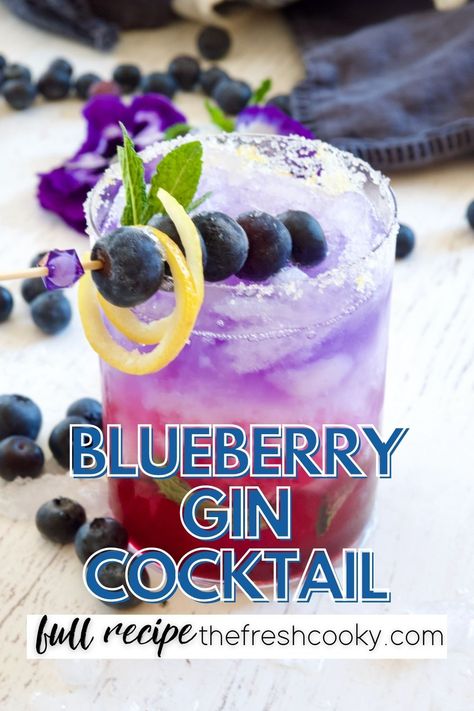 Learn the easy steps to a layered cocktail in this simple and delicious recipe for Blueberry Gin Fizz cocktail. Blueberry Syrup, Ginger Beer and Empress Gin on top. Recipe and how to @thefreshcooky Blueberry Gin Cocktail, Cocktail Blueberry, Empress Gin Cocktail, Blueberry Simple Syrup, Empress Gin, Homemade Blueberry Syrup, Blueberry Cocktail, Blueberry Gin, Layered Cocktails