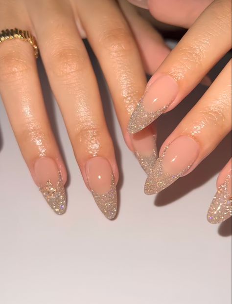 Almond Nails With Tip Color, Nude Glitter French Tip Nails, Gold Glitter French Tip Nails Coffin, Long Almond Glitter Nails, Natural Acrylic Nails With Glitter, Formal Gold Nails, Bling French Tip Nails Almond, Birthday Sparkly Nails, Almond Glitter French Tip Nails