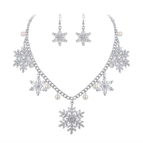 PRICES MAY VARY. Want to add something "bling" in winter? This snowflake jewelry set will be a GREAT choice for you. This Christmas Jewelry is inspired from winter snowflake, which is the most popular subject in the jewelry world nowadays. Wearing a dinner dress, beautiful outfit or spectacular in casual wear, matching this dangle earrings necklace set, it will be equally gorgeous in Christmas party, 2020 Happy New Year, dancing and other special events. This graceful and beautiful fashion snowf Snowflake Jewelry, Earrings Necklace Set, Snowflake Necklace, Winter Jewelry, Christmas Necklace, Jewelry Fashion Trends, Necklace Chain Lengths, Dinner Dress, Holiday Jewelry