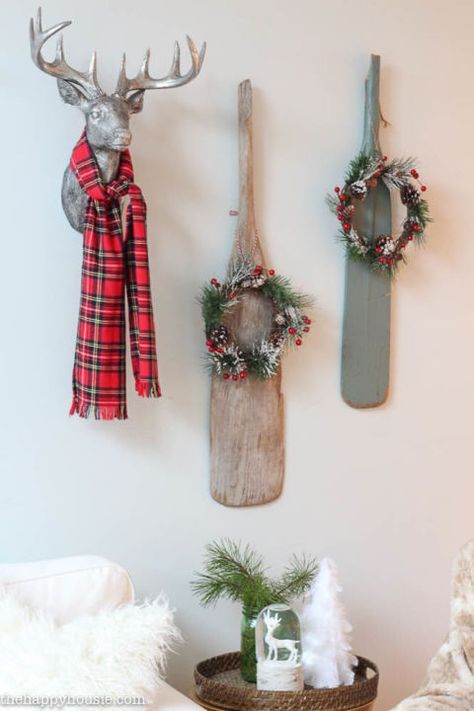 Gussy up your everyday wall decor for Christmas by adding plaid scarves and small wreaths. See more at the Happy Housie. Lake Christmas Decor, Lake Christmas, Christmas Decorating Ideas, Christmas Living Room, Christmas Cottage, Tartan Christmas, Cottage Christmas, Christmas Time Is Here, Lake Cottage