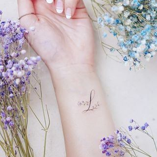 65 Amazing L Letter Tattoo Designs and Ideas 39 L Letter Tattoo, Letter L Tattoo, Hello Tattoo, Small Letter Tattoo, L Letter, Tiny Wrist Tattoos, Letter Tattoo, Alphabet Tattoo Designs, Cool Wrist Tattoos