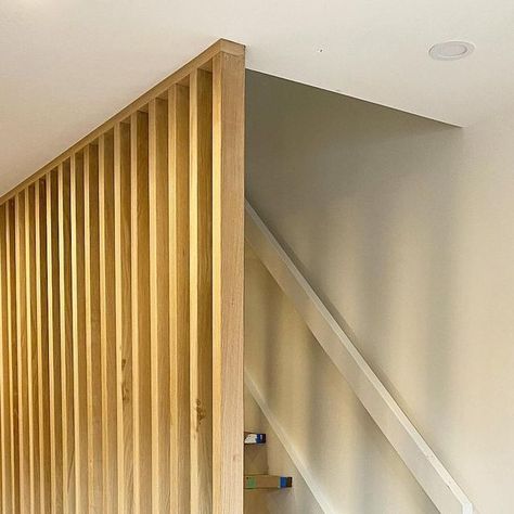 Deluxe Stair & Railing Ltd 🇨🇦 on Instagram: "The feature slat wall with a continuation to the basement is now complete for our friends @menatworkdesignbuild. We used solid 1-3/4” slats in White Oak Flat Cut with a thinner upper and lower plate. With the open rise stairs between the walls, there will be endless light flow! ••••••••••••••••••••••••••••••••••••••••••••••••••••••••••••• #feature #eastermonday #houseandhome #homedecor #toronto #decor #carpentry #construction #woodworking #work #stairs #wood #love #staircase #reno #carpenter #sold #architect #design #easter #transformation #renovation #stair #interiors #interiordesign #interior #designer #oak #realestate #bespoke" Stairs Wood, Slate Wall, Room Stuff, Slat Wall, The Basement, Stair Railing, Wood Slats, Front Room, Architect Design