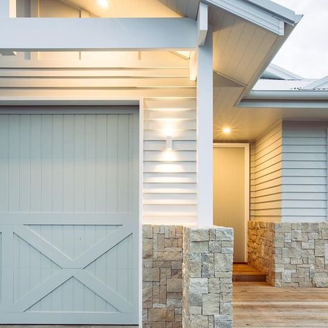 It’s all in the detail ✨ @scyonwalls Linea weatherboard mixed with limestone & a timber garage door! Door colour: @taubmans ‘Snow Olive’ (in a half tint). All details on the journal x 📷: @shotbygrace #longjettyreno #ScyonWalls #Scyon #Linea #WhereIdwell #MixedFacades Timber Garage Door, Timber Garage, Hamptons Modern, House Trim, Modern Country Style, Exterior Makeover, Stone Cladding, Hamptons House, Exterior Stone