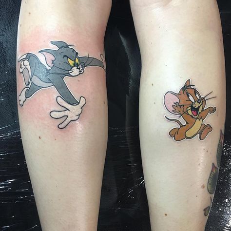 75 Likes, 1 Comments - Gilt Moth Tattoo (@giltmothtattoo) on Instagram: “Something fun by @bendawsontattoo - that little line of white ink around the edges really makes…” Matching Tom And Jerry Tattoos, Tom And Jerry Tattoo Ideas Matching, Couples Cartoon Tattoos, Tom And Jerry Couple Tattoo, Tom Y Jerry Tattoo, Tom And Jerry Tattoo Design, Tom And Jerry Tattoo Ideas, Tom And Jerry Tattoo, Tom Tattoo