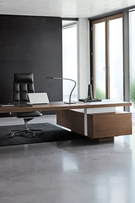 The spacious desk’s architecture made for management offices wins with clarity. With its powerful aesthetics, the streamlined proportions generate an impressive aura. For vision and trust on C level. #furniture #interior #luxuryinteriors #luxuryfurniture #design #moderndesign #modernism #madeingermany #executive #desk #office Ceo Office Design Luxury Modern, Ceo Office Design Luxury, Luxury Office Design, Ceo Office Design, Company Interior Design, Executive Office Design, Desk Modern Design, Company Interior, Office Desk Designs