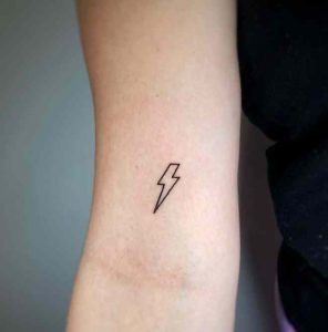 Small Lightning Bolt Tattoo Finger, Minimal Lightning Bolt Tattoo, Finger Tattoos Lightning Bolt, Lightning Bolt Tattoo Placement, Lightning Bolt Wrist Tattoo, Lighting Bolt Tattoo Meaning, Lighten Bolt Tattoo, Lightning Bolt Tattoo Arm, Lightning Bolt Tattoo Men