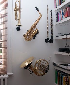 Penty of stands available! Saxophone Wall Mount, Instrument Display Wall, Instrument Display Ideas, Instrument Display, Flute Stand, Brass Instrument, Diy Music, Music Room Decor, French Horn