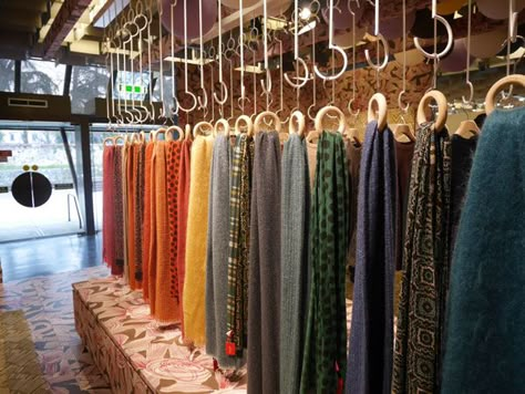 Great inspiration from Tokyo on how to display scarves! How To Display Silk Scarves, Scarf Store Design, Scarf Display Ideas, Display Scarves, Fabric Shop Display, Scarves Store, Fabric Store Design, Scarf Display, Unique Interiors