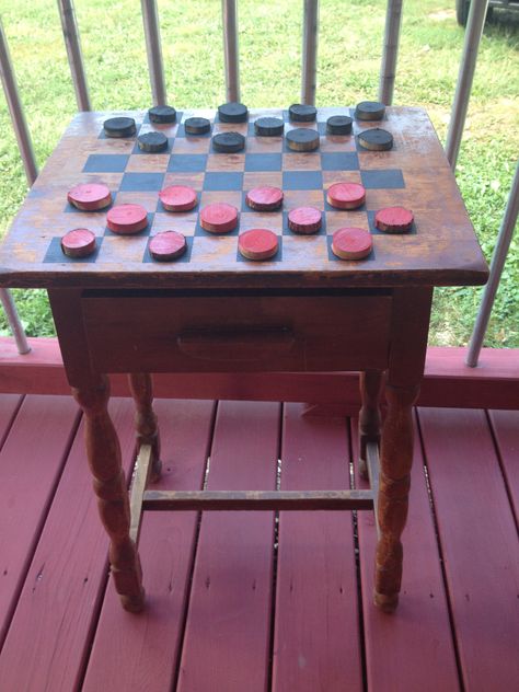 Outdoor checker table made from an old distressed end table.  Checker pieces made from a limb!! Checker Table, Outdoor Checkers, Checkers Table, Checkerboard Table, Wooden Cooler, Family Board Game, Board Game Table, Primitive Homes, Game Tables