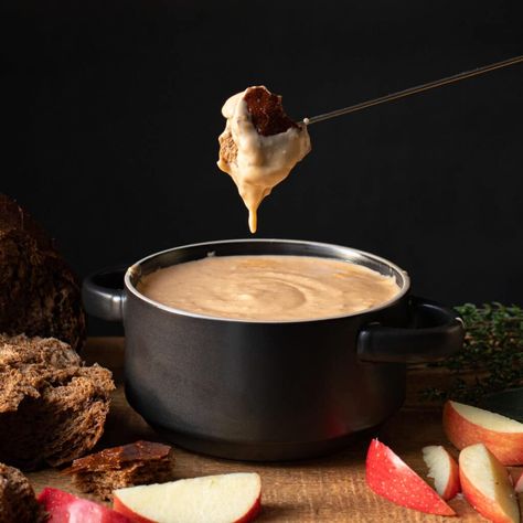 Hard Cider Fondue Dip Recipe - a warm, garlicky pot of melted aged cheddar, perfect for dipping crusty bread, fruit and veggies Fondue Dip, Pumpkin Fondue, Cheddar Fondue, Cold Finger Foods, Fondue Recipe, Bread Fruit, Thanksgiving 2023, Fruit And Veggies, Healthy Appetizer Recipes