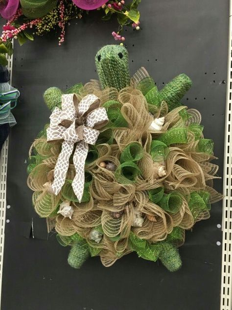 Original turtle design, deco mesh wreath by Don Carpenter A. C. Moore store # 154 Greenville, NC Turtle Wreath, Decorative Mesh Wreaths, Deco Mesh Crafts, Making Mesh Wreaths, Fall Mesh Wreaths, Turtle Baby, Burlap Mesh Wreath, Mesh Wreath Tutorial, Greenville Nc