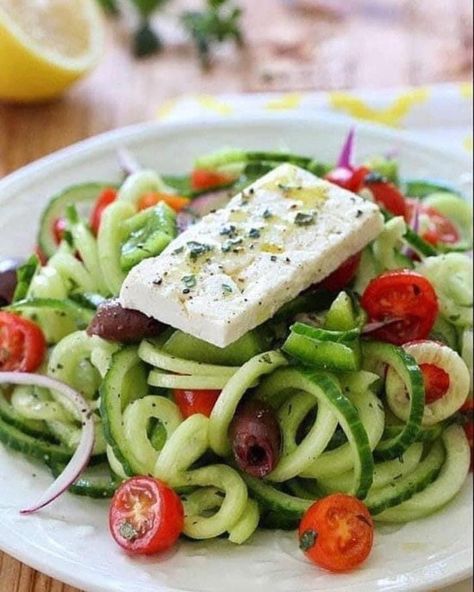 ⬇️⬇️⬇️⬇️⬇️⬇️⬇️⬇️⬇️⬇️⬇️⬇️⬇️ ￼ Spiralized Greek Cucumber Salad with Lemon and Feta Makes 3 servings Each serving provides: 1 green 1 healthy fat 3 condiments • 1 cup English cucumber • 1/4 of a green bell pepper, chopped • 1/4 cup grape tomatoes, halved • 5 pitted kalamata olives • 1 tbsp red onion, sliced • 2 tablespoons fresh lemon juice • 1 oz fresh feta, sliced thick • 1/2 tablespoon extra virgin olive oil • 1/8 teaspoon kosher salt and ¼ tsp freshly ground black pepper • 1/2 teaspoon fre Spiralized Cucumber, Veggetti Recipes, Greek Cucumber, Greek Salads, Salad Taco, Greek Cucumber Salad, Salad Macaroni, Salad Kale, Savory Tarts