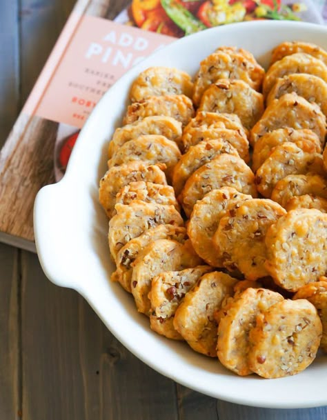 Southern Cheese Crackers recipe + Add a Pinch Cookbook Southern Cheese Biscuits, Cheeseit Snack Recipe, Southern Appetizers Easy, Peg Bracken Recipes, Cheese Cracker Recipes Homemade, Home Made Cheese Crackers, Cracktastic Crackers, Southern Appetizer Recipes, Southern Cheese Straws Recipes