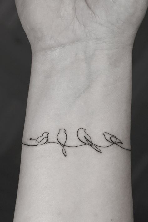 Tattoo Artist Selection Guide: How To Find The Right One For You Fine Line Bird On Branch Tattoo, Family Line Tattoo Ideas, Bird Mom Tattoo, Bird Flight Tattoo, Family Of Three Tattoo, Bird Bracelet Tattoo, Sun And Birds Tattoo, Bird Family Tattoos For Women, Simplistic Bird Tattoo