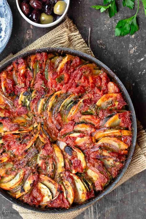 Briam:Traditional Greek Roasted Vegetables (Video) | The Mediterranean Dish Greek Roasted Vegetables, Vege Dishes, Ratatouille Recipe, Greek Flavors, God Mat, Mediterranean Dishes, Red Onions, Green Goddess, Mediterranean Diet Recipes