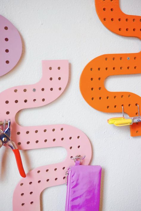 Introducing our first line of Curious pegboards! Make your workspace feel that much more unique and inspiring with our retro inspired wall-mounted pegboards. Organize a wide variety of your items and make the clutter look cute ✨Fits standard sized 1/4” metal pegboard hooks which are widely available at major hardware s Pegboard Room Divider, Rainbow Pegboard, Craft Peg Board, Pegboard Hacks, Peg Board Display, Van Interiors, Jigsaw Projects, Confetti Wall, Pegboard Display