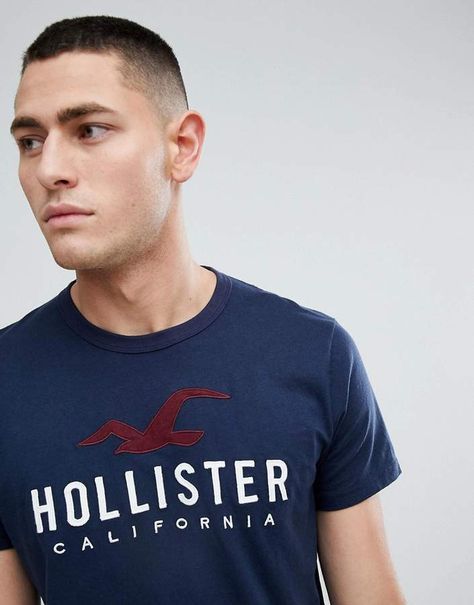 Hollister Iconic Applique Logo T-Shirt in Navy #mens, #promotion Hollister Men, Hollister California, Navy Fashion, Plain Design, Summer 2022, Logo T Shirt, Casual T Shirts, Hollister, Tshirt Logo