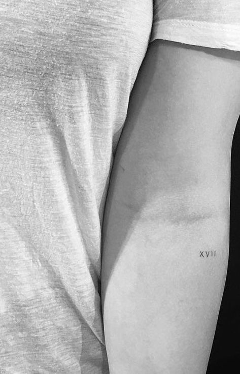 Womens Mini Tattoo, Micro Roman Numeral Tattoo, Minimalistic Number Tattoo, Micro Number Tattoo, Small Anniversary Tattoo Ideas, Single Number Tattoo, Minimalist Number Tattoo, Roman Numeral 7 Tattoo, Roman Numeral 5 Tattoo