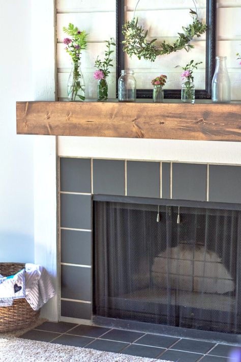 Transform your fireplace on a tight budget with this easy step-by-step tutorial on how to paint your fireplace surround and tile. Plus, learn how to easily paint stained wood with low VOC products. How To Paint Fireplace, Fireplace Makeover Diy, Paint Fireplace Tile, Floating Fireplace Mantel, Diy Fireplace Mantel, Floating Fireplace, Rustic Fireplace Mantels, Diy Fireplace Makeover, Mantle Ideas