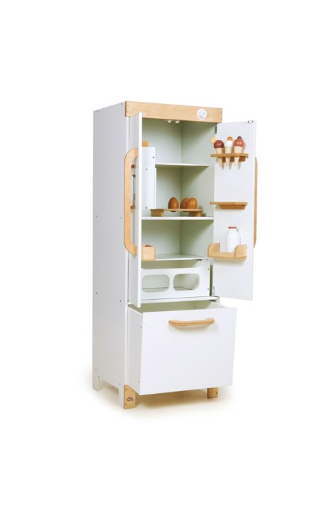 Your tiny chef will have a blast cooking up masterpieces in this deluxe play refrigerator made from smooth rubber wood packed with fun surprises. This fridge comes stocked with wooden eggs, ice cream cones, a milk bottle and a functional, button-operated ice cube dispenser. Ages 3 and up 14.17" x 13.39" x 39.76" 34.67 lb. Assembly required Includes fridge, ice cubes, three ice cream cones, three eggs with stand, one milk bottle and two magnets Rubber wood Spot clean Imported White Fridge, Bottle Of Milk, White Fridges, Grand Kitchen, Egg Stand, Play Kitchens, Aesthetic Baby, Kitchen Fridges, Brown Eggs