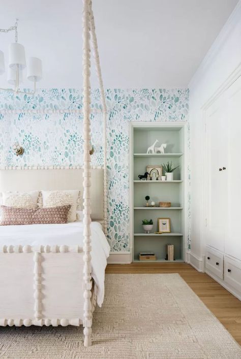 An easy way to make a canopy bed look modern is to skip the canopy. Kate Marker Interiors outfitted this teenage girls' room with a carved bleached wood canopy bed finished with a neutral upholstered headboard that is both playful and sophisticated enough for an older child. #diybedroomdecor #dreambedroom #teenagegirlbedroomideas #bohobedroomideas  #apartmentdecor  #apartmentliving #smallspacedecorating #thespruce White Wood Canopy Bed, 4 Post Canopy Bed Ideas, Girls Coastal Bedroom, Girls Bedroom Desk Ideas, Girls Canopy Bed Ideas, Canopy Bed Aesthetic, Girls Bedroom Desk, Coastal Girls Bedroom, Girls Bedroom Paint Ideas