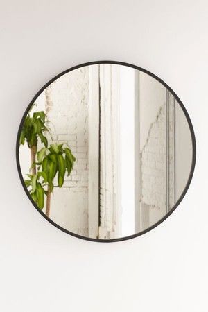 The Everygirl Cofounder Alaina Kaczmarski's Greystone Home Tour | The Everygirl Black Bathroom Paint, Mirrors Urban Outfitters, Circle Mirror, Circular Mirror, Trendy Bathroom, Bedroom Mirror, Bath Room, Round Mirror, Painting Bathroom