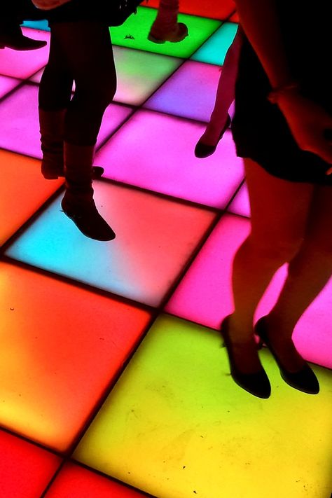 Partygoers on a light up disco dancefloor like bars in Los Angeles 1970s Posters, Disco Moodboard, Aesthetic Arcade, Los Angeles Nightlife, Disco Dance Floor, 60s Disco, Ibiza Poster, Disco Rave, Launch Event Ideas