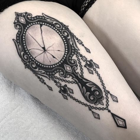 Black Ornamental Broken Hand Mirror Tattoo | Tattoo Ideas and Inspiration Hand Mirror Tattoo, Vintage Mirror Tattoo, Ojo Tattoo, Mirror Tattoo, Victorian Tattoo, E.t Tattoo, Mirror Tattoos, Jewel Tattoo, Tattoo Meaning