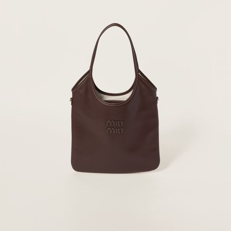 Briarwood Ivy Leather Bag | Miu Miu Iconic Logo Design, Miu Miu Bag, Lettering Logo, Brown Leather Bag, Iconic Logo, Brown Bags, Leather Tote Bag, A Signature, Naples