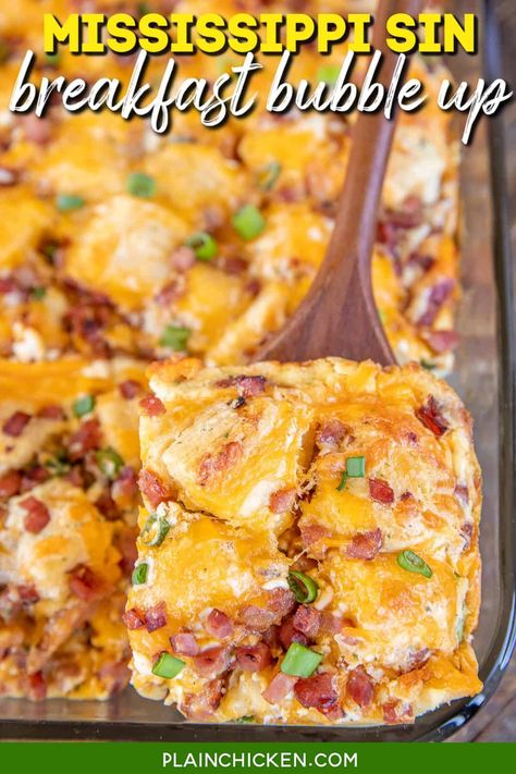 Mississippi Sin Breakfast Bubble Up recipe – quick and easy ham and cheese biscuit breakfast casserole! Great for baby showers, overnight guests, and holiday mornings. Only takes a few minutes to make and is ready to eat in about 35 minutes. Ham, cheddar cheese, green onions, biscuits, cream cheese, sour cream, Worcestershire sauce, hot sauce, and garlic powder. We LOVE this quick and easy casserole for breakfast, lunch, and dinner! Breakfast Bubble Bake, Breakfast Bubble Up Bake, Breakfast Bubble Up, Bubble Up Breakfast Casserole, Chicken Bubble Up Bake, Canned Biscuit, Breakfast Casserole With Biscuits, Ham Breakfast, Easy Ham