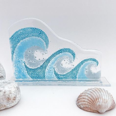 I’ve just added this freestanding fused glass coastal wave sculpture to my Etsy shop (link in bio.) My favourite comment from my craft fair this weekend was “it looks like a letter holder.” Don’t you just love comments at craft fairs when you’re blatantly right there 😆🙄 I’m going to start a new hashtag as I’ve heard about every comment going having done this for nearly 20 years now. Lots of really lovely comments as well as some not so much. Join in if you have some real gems #thingsover... Wave Sculpture, Transparent Art, Fused Glass Artwork, Letter Holder, Glass Artwork, Turquoise Glass, Glass Art Sculpture, Hand Written, Craft Fair