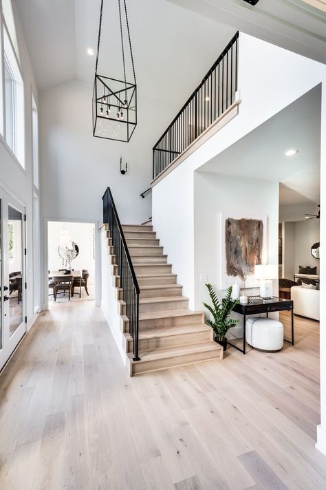 Gorgeous entryway for a transitional modern home Modern Transitional Flooring, Modern Transitional Staircase, Modern Entryway With Stairs, Exterior Modern Farmhouse Ideas, Modern House Entrance Interior Entryway, Traditional Modern Staircase, Spanish Modern Staircase, Modern New Construction Home, Transitional Home Inspiration