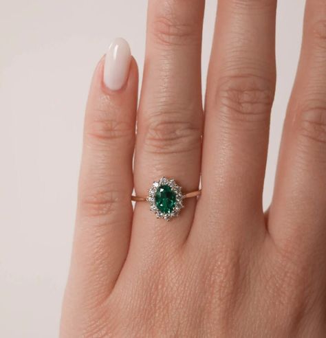 Introducing the Emerald Ring! This beautiful ring is made of gold and emeralds, making it a perfect gift for any special occasion. Whether you're planning an engagement or wedding, this ring is sure to make a statement. With its unique green hue, this ring is also a great choice for anyone who loves nature. Add this ring to your collection today! 14K Gold Emerald Ring-Engagement Ring-Halo Emerald Ring-Green Stone Ring-Lab Emerald Ring-Oval Emerald Ring-May Birthstone Ring-Gift For Her ABOUT RING Oval Shaped Emerald Ring, Wedding Ring Emerald Green, Timeless Engagement Rings Emerald, Vintage Emerald Gold Ring, Emerald And Silver Ring, Oval Cut Emerald Ring, Round Emerald Engagement Ring, Emerald Oval Ring, Small Emerald Engagement Ring