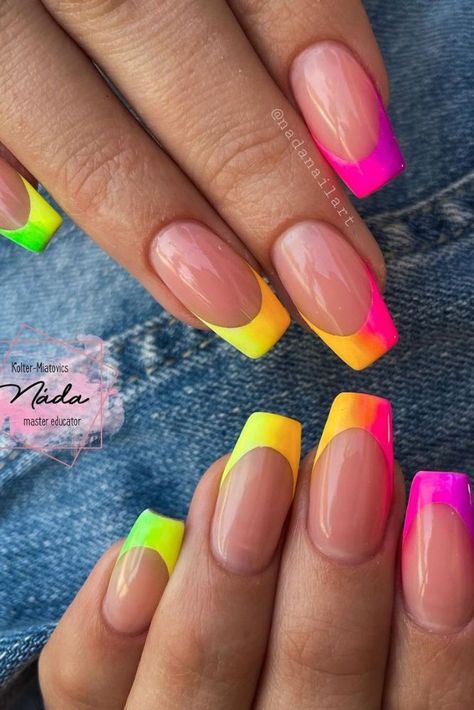 Get your nails summer-ready with these neon pop French tips! These bright colors will make your fingertips pop and add a fun touch to your summer outfits. Perfect for beach trips or pool days. #summernails #neonpop #frenchtips #nailart #beautytips