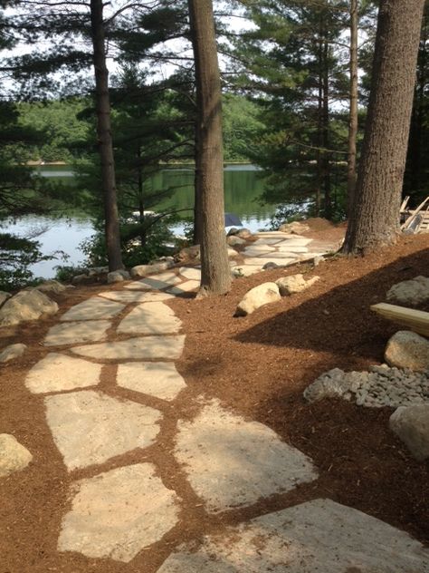 Granite stepping stone pathway leading down to Lake Muskoka waterfront Lake Pathway Ideas, Pathway From House To Lake, Lake Walkway Pathways, Shoreline Landscape Ideas, Cabin Pathways, Lake Pathway, Waterfront Landscaping, Stepping Stone Pathway, Lake Muskoka