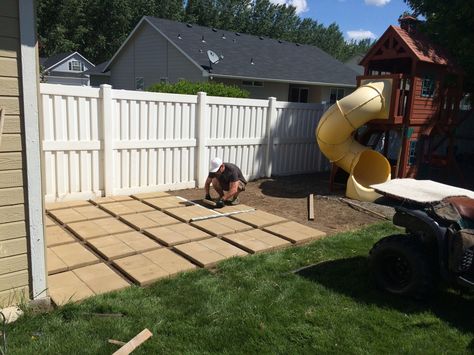 Build your own patio! 12"square pavers in sets of 4, far less expensive than 24" pavers. Just evenly spaced and set with pea gravel! This was an inexpensive and temporary way to cover our garden space that has become a weed patch after child number 4:) Build Your Own Patio, Cheap Patio Pavers, Square Pavers, Outdoor Patio Pavers, Inexpensive Backyard Ideas, Concrete Backyard, Patio Blocks, Patio Images, Diy Patio Pavers