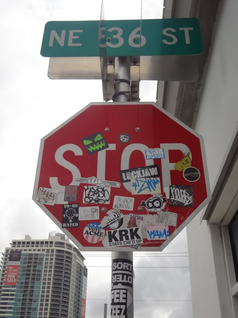 Sticker bombed stop sign across from the Shops at Midtown, in the Miami Design District. Stop Sign Graffiti, Stop Sign Art, Street Art Poster, Street Poster, Shopping District, Graffiti Words, Miles Morales Spiderman, Graffiti Writing, Graffiti Stickers