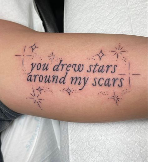 Cute Lyric Tattoos, Taylor Swift Tattoo You Drew Stars, You Drew Stars Around Scars Tattoo Arm, Love Scars Tattoo, Taylor Lyric Tattoos, Written In The Stars Tattoo, Scars Cover Up Tattoo, All Of The Stars Have A Reason Tattoo, Stars Around Scars