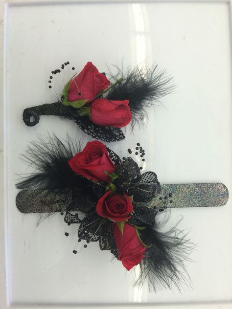 Red and black corsage and Boutonniere Red Black Corsage, Corsages And Boutonnieres Homecoming, Black And Red Boutonniere, Red And Black Corsage And Boutonniere, Corsage Red And Black, Black And Red Corsage, Black Corsage And Boutonniere, Red And Black Corsage, Diy Corsage Wristlet