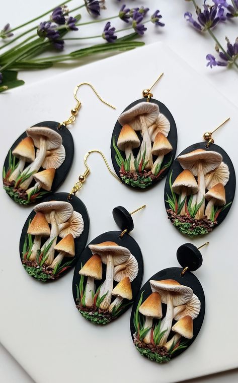 These handmade Magic Mushroom Earrings, crafted from polymer clay, are unique and dainty mushroom gifts perfect for cottage core enthusiasts, embodying whimsical jewelry. They make a charming gift for her and a nice gift for girlfriend. 🦋𝐋𝐄𝐍𝐆𝐓𝐇: 2 inches  🦋 𝐖𝐈𝐃𝐓𝐇: 1  inch  🦋 𝐌𝐀𝐓𝐄𝐑𝐈𝐀𝐋𝐒:🔹Polymer Clay 🔹Hypoallergenic nickel-free gold plated and silver plated attachment and parts🔹Attachments for sensitive ears are available upon request (please message the seller) 🦋𝐏𝐀𝐂? Polymer Clay Cameo, Mushroom Clay Earrings, Polymer Clay Mushroom Earrings, Clay Mushroom Earrings, Polymer Clay Mushrooms, Cottage Core Mushroom, Mushroom Gifts, Cottage Core Jewelry, Clay Mushrooms