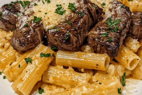 Savor Garlic Butter Steak with Creamy Parmesan Rigatoni! Tender steak paired with creamy, cheesy rigatoni for a flavorful, indulgent meal. Cheesy Rigatoni, Mini Cheesecakes Easy, Butter Steak, Steak Tips, Tender Steak, Indulgent Food, Garlic Butter Steak, Creamy Parmesan, Mini Cheesecakes