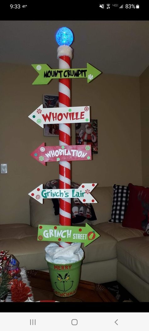 Grinch Diy Dollar Tree, The Grinch Signs Diy, Grinch Christmas Decorations Indoor, Office Christmas Decorations Grinch, Grinch Decorations House, Grinch Theme Office Decorations, Decorated Grinch Tree, Grinch Staircase, Christmas Cubicle Decorations Contest Grinch