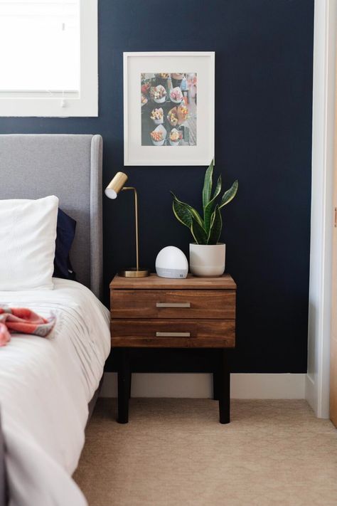 Our bedroom in our 1950s ranch house doesn't have an ensuite bathroom or big closet, but we made the most of it! Check out this cozy navy blue bedroom. Modern Farmhouse Bedroom Decor, Bedroom Navy, Navy Bedrooms, Blue Bedroom Walls, Dark Blue Bedrooms, Navy Blue Bedrooms, Farmhouse Bedroom Decor Ideas, Blue Bedroom Decor, Farmhouse Bedroom Decor