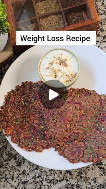 Kanak Gurnani on Instagram: "Weight Loss Recipe  Vegetable Ragi Cheela  Preparation Time 10 mins Cooking Time 20 mins  Serves 3 Cheelas Ingredients  Vegetables 2 Cups Coriander Leaves 2tbsp Green Chilli 1 Ragi/ Nachni Flour 4 tbsp Sattu/Roasted Chana 2tbsp Red Chilli 1tsp Salt to taste  Sesame Seeds 1tbsp Jeera Powder 1tsp Water 1/4 Cup Ghee/Oil 1tsp Steps ➡️ In a mixing bowl add finely chopped vegetables along with Ragi Flour , Sattu, Spices and Sesame seeds.  ➡️ Add water in batches and make a thick batter. ➡️ Brush some oil in a pan or tawa and spread small thin cheela. Cover and cook on low flame for 2-3 mins. ➡️ Cook both sides until crisp. ➡️ Serve with any homemade Chutney or Curd.  Love ❤️ #kanak_gurnani   #weightloss #weightmanagement #weightlossrecipes #dietfood #ragirecipes #fin Ragi Recipes Breakfast, Ragi Flour Recipes, Fat Free Snacks, Ragi Recipes, Anti Inflammation Recipes, Vegetarian Snacks, Green Chilli, Red Chilli, Flour Recipes