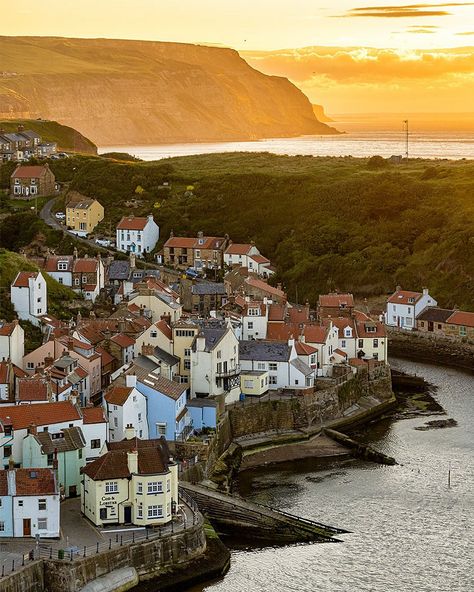 Fantasy Seaside Town, Seaside Town Aesthetic, Sea Side Town, Seaside Town Art, England Seaside Town, Country Living Uk, Dramatic Sunset, Cottages By The Sea, Sunset Glow