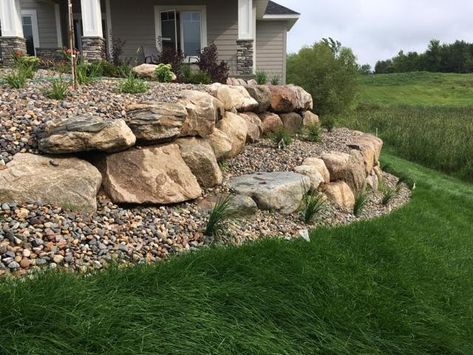 Terraced boulder retaining walls provide beauty, strength and longevity to your landscape. Boulder Slope Landscaping, Rockbed Landscaping, Tiered Retaining Wall Ideas Hillside, Retaining Wall Ideas Hillside, Rock Terrace, Greenhouse Landscape, Rock Wall Landscape, Tiered Landscape, Boulder Wall