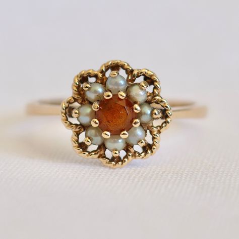 [SOLD] A 9K solid gold ring includes an orange topaz stone surrounded by seed pearls. Beautiful vintage ring, it is a size 6 3/4 and weighs 2.06g. The condition is used and good. Price: $300AUD Free standard post is offered however insurance is an additional. Orange Ring, Beautiful Rings Vintage, Solid Gold Ring, Solid Gold Rings, Topaz Stone, Seed Pearl, Gold Wedding Rings, Vintage Ring, Vintage Rings