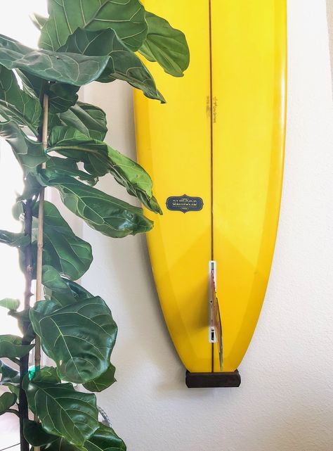 Best Way to Hang A Surfboard On Your Wall | Almond Surfboards & Designs Surfboard Hung On Wall, Mounted Surfboard Decor, How To Hang A Surfboard On The Wall, Vertical Surfboard Wall Mount, Hang Surfboard On Wall, Surfboard Display Ideas, Surfboard Mounted On Wall, Hanging Surfboard On Wall, Surfboard Wall Mount