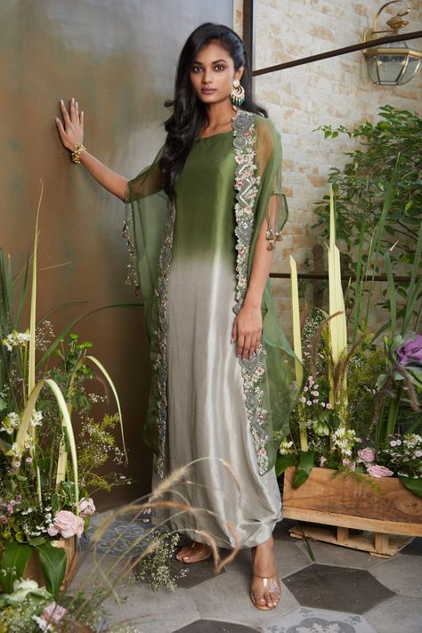 Buy Grey Dress Silk Embroidery Floral Dress Boat Neck Knotted With Cape For Women by Prisho Online at Aza Fashions. Stylish Kurtis Design Party Wear Indian, Cape Dress Indian, Peace Era, Cape Organza, Cape Dress Long, Cutwork Dress, Knotted Dress, Cape For Women, Embroidered Cape